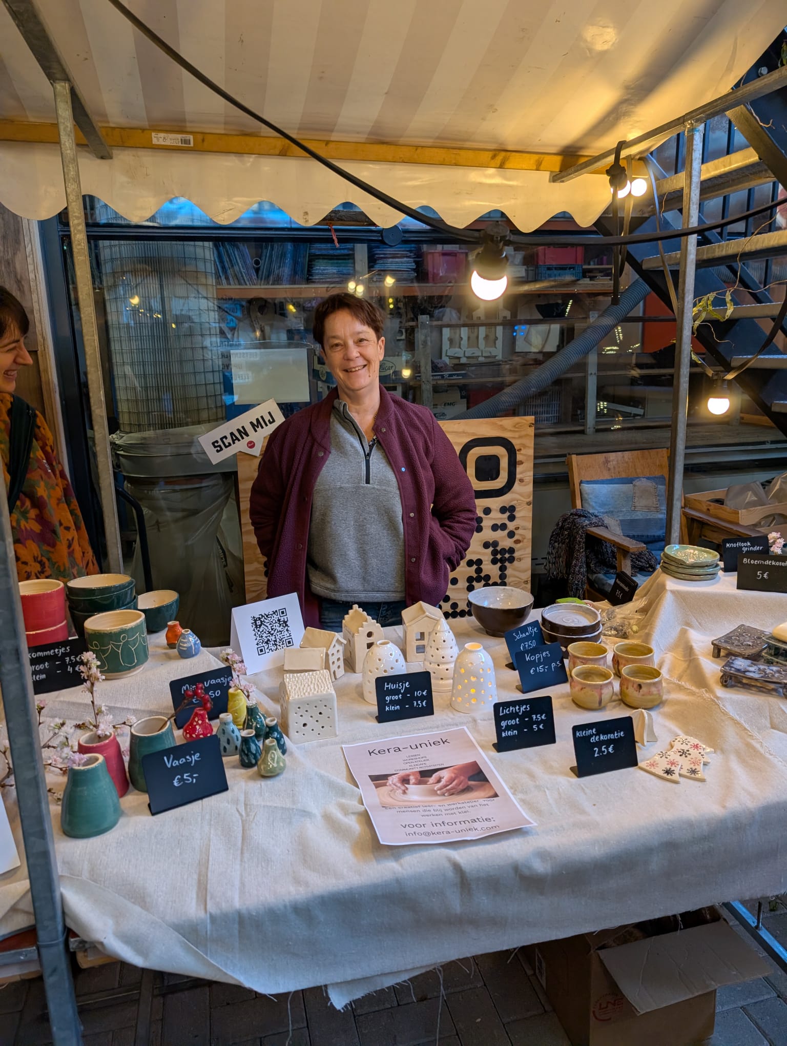 Els at the Christmas market selling her handmade pottery in Delft